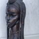 Large wooden bust of an African woman.