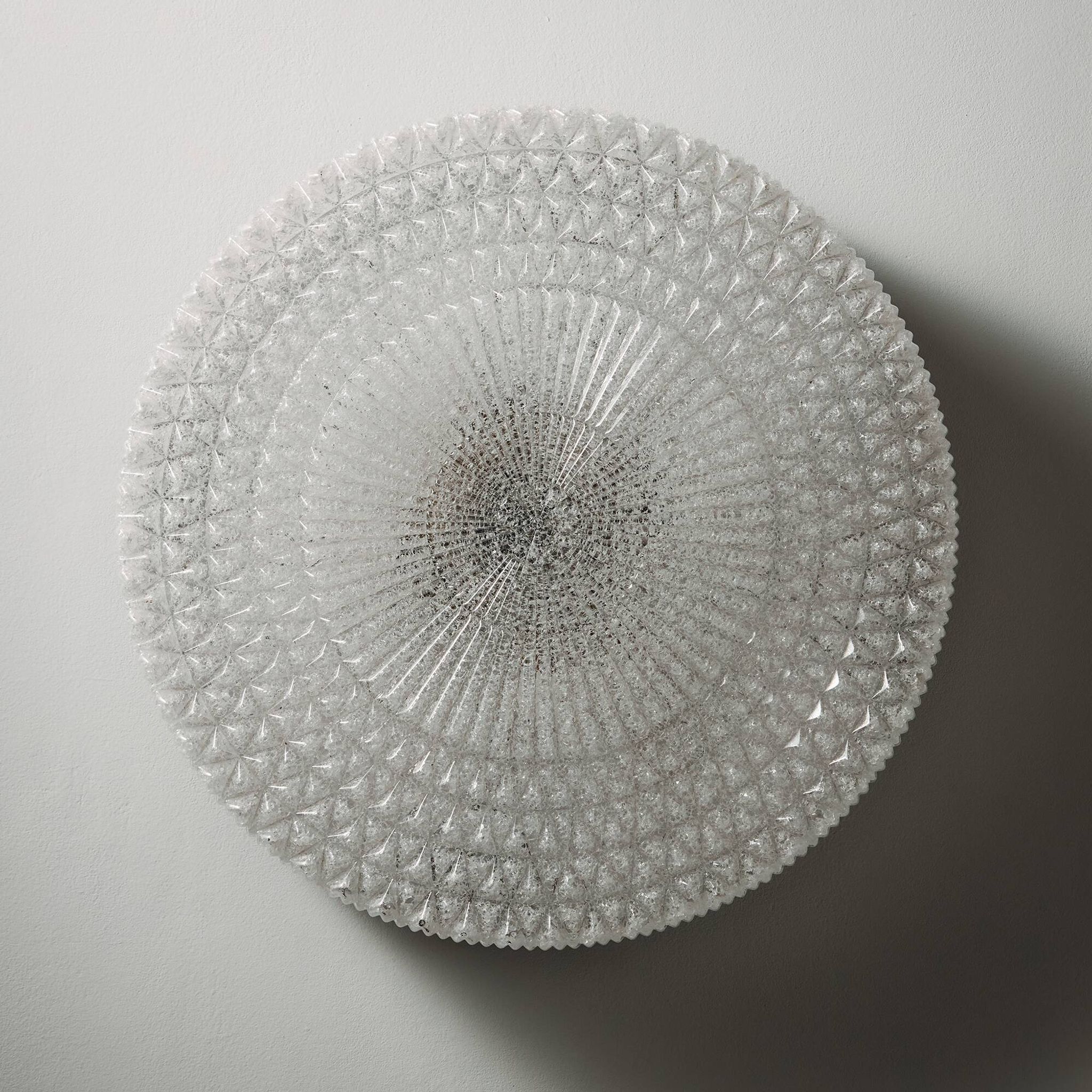 Wall light in metal and plastic