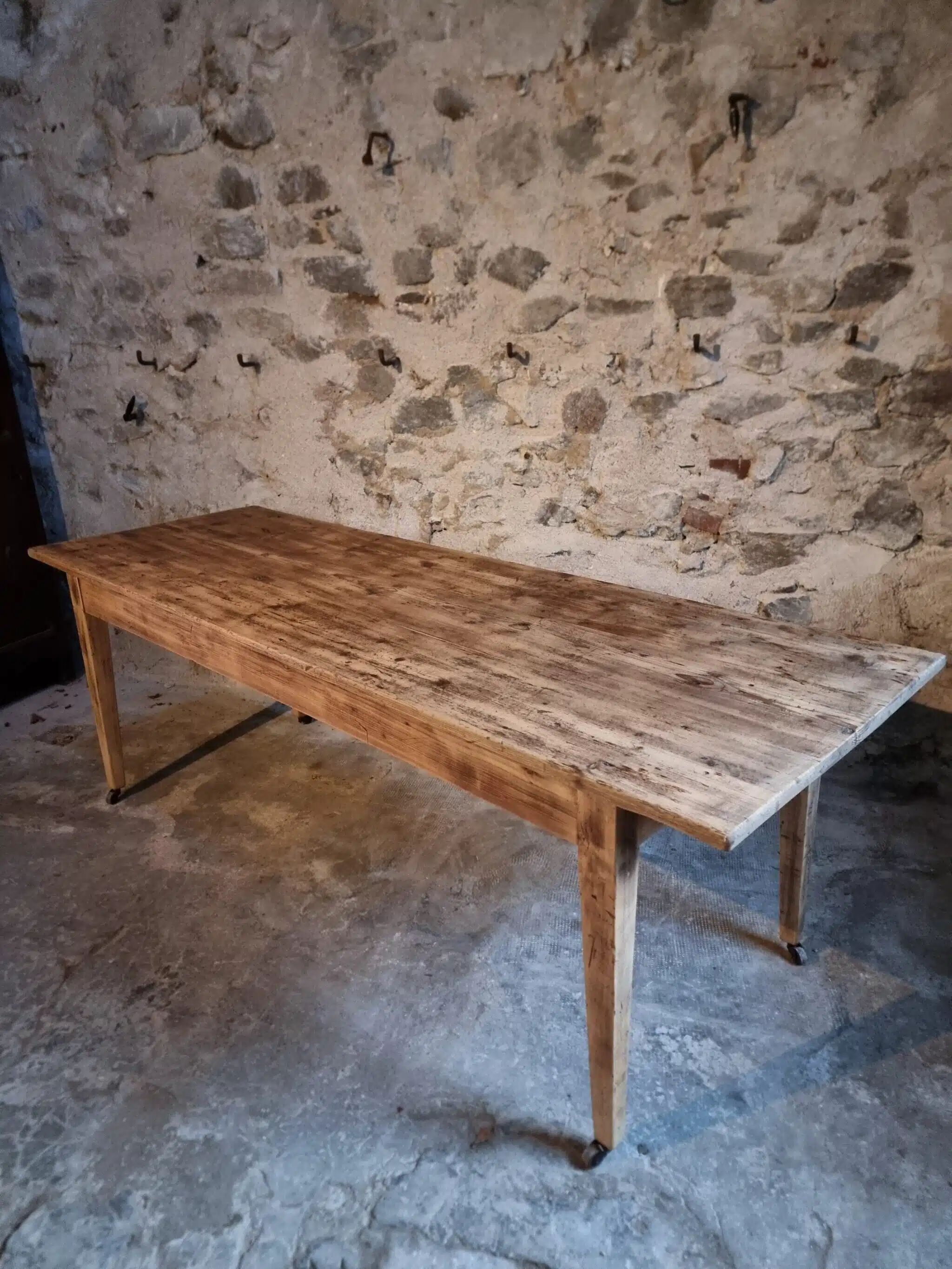 Antique French pine dining table, large farmhouse table on wheels, 19th century.