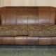 Vintage leather sofas by Thomas Lloyd with Kilim cushions.