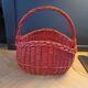 Red painted rattan basket