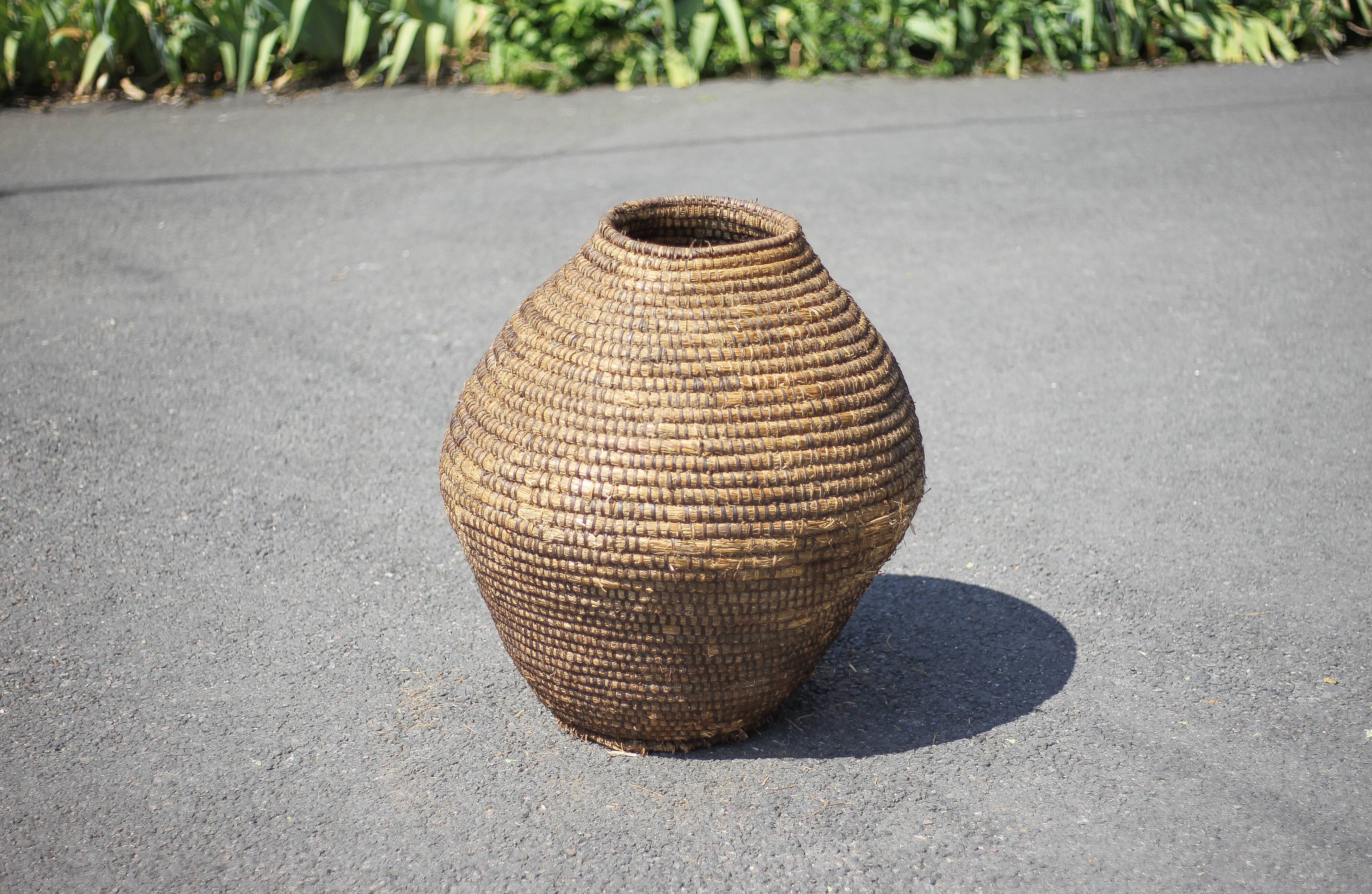 Large old basket, burgundy straw and bramble, woven basket