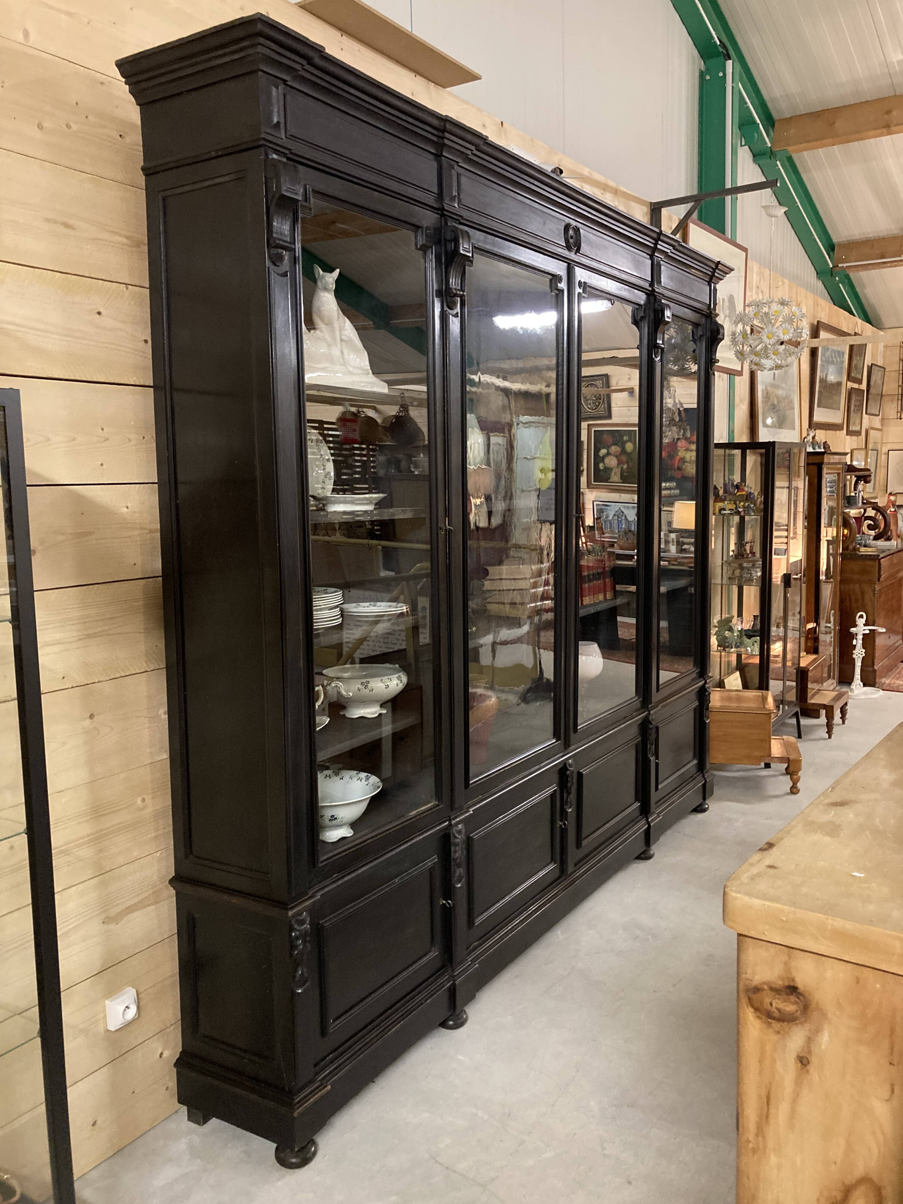 Library from the Napoléon III era in blackened pear wood.
