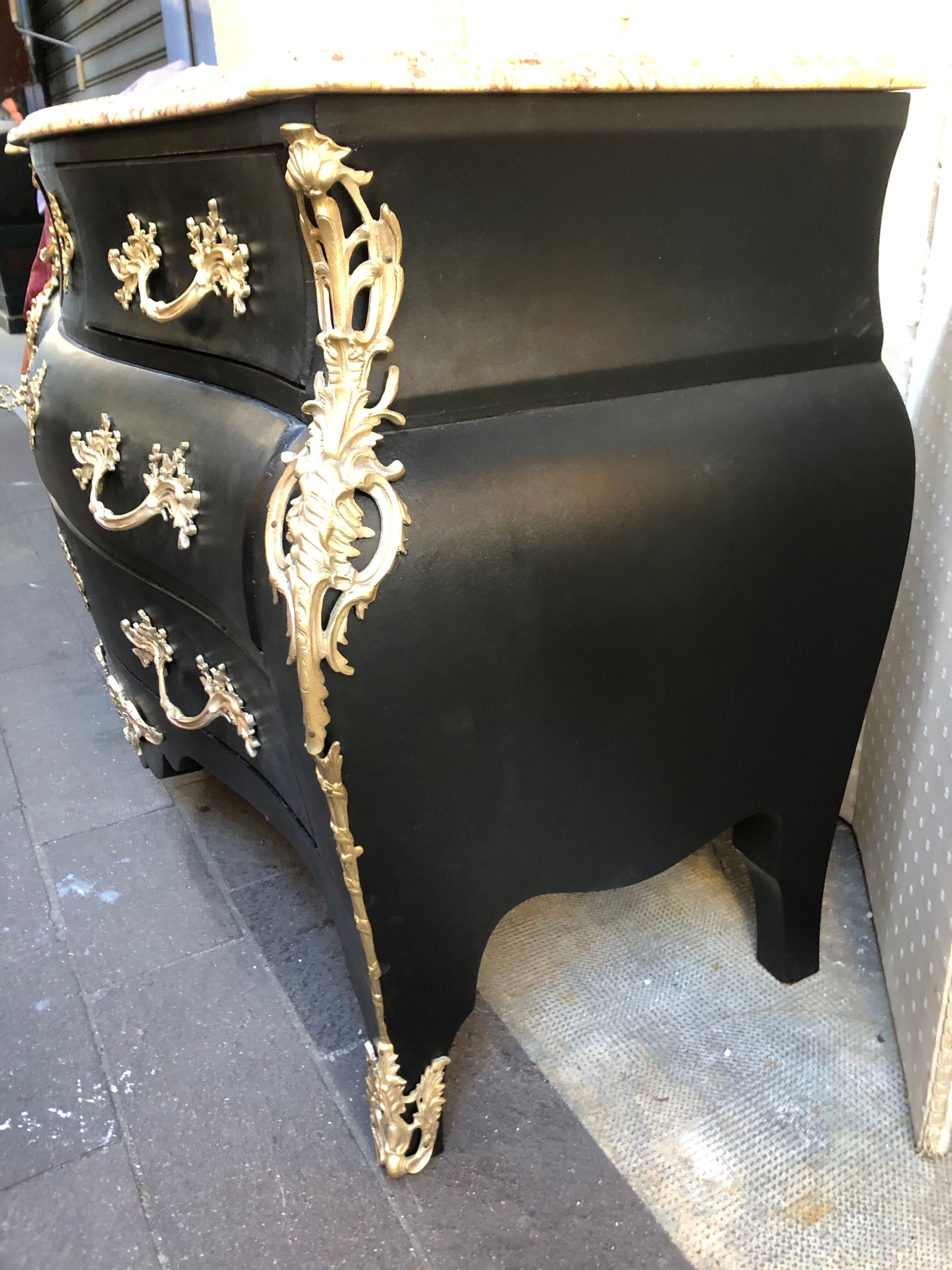 Chest of drawers "tomb" patinated black regency style