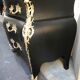 Commode "tombeau" patiné noire style régence