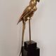 Decorative sculpture in solid brass representing a parrot, 1970s, Palm Beach/Hollywood Regency.