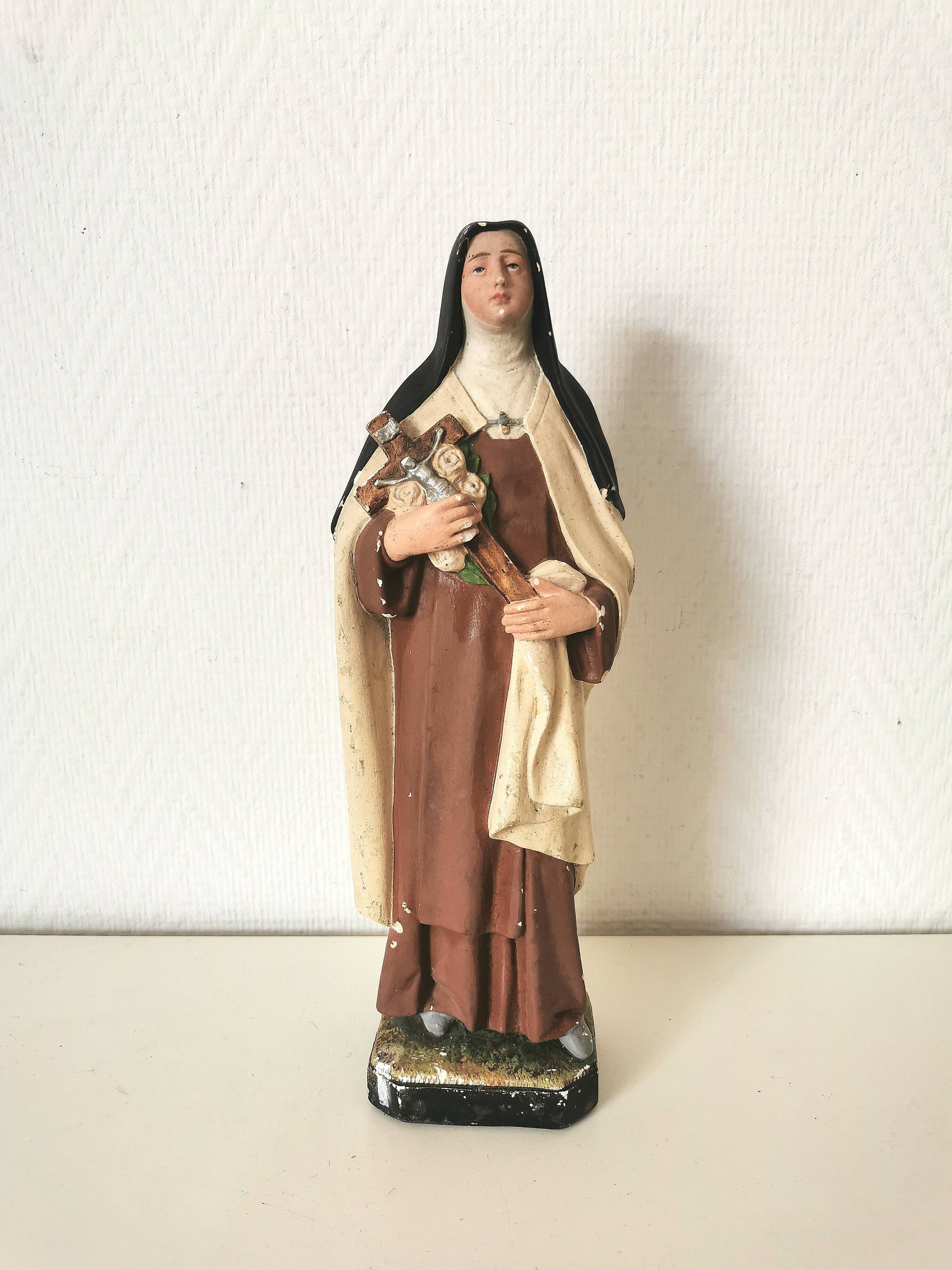 religious statue of Saint Therese of Lisieux in painted plaster