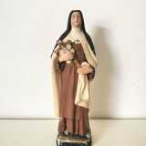 religious statue of Saint Therese of Lisieux in painted plaster