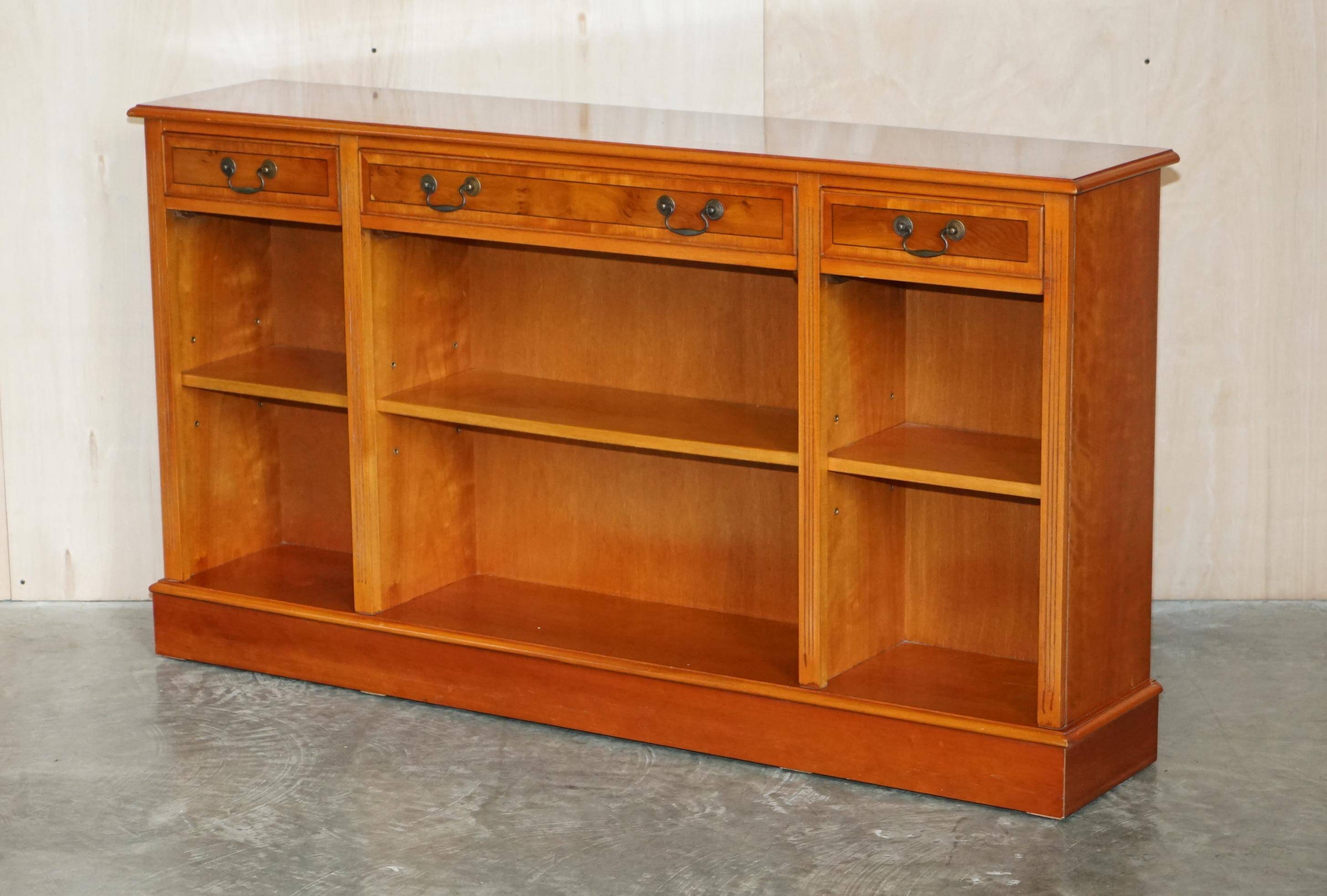 Vintage yew wood library/buffet with three drawers.