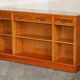 Vintage yew wood library/buffet with three drawers.