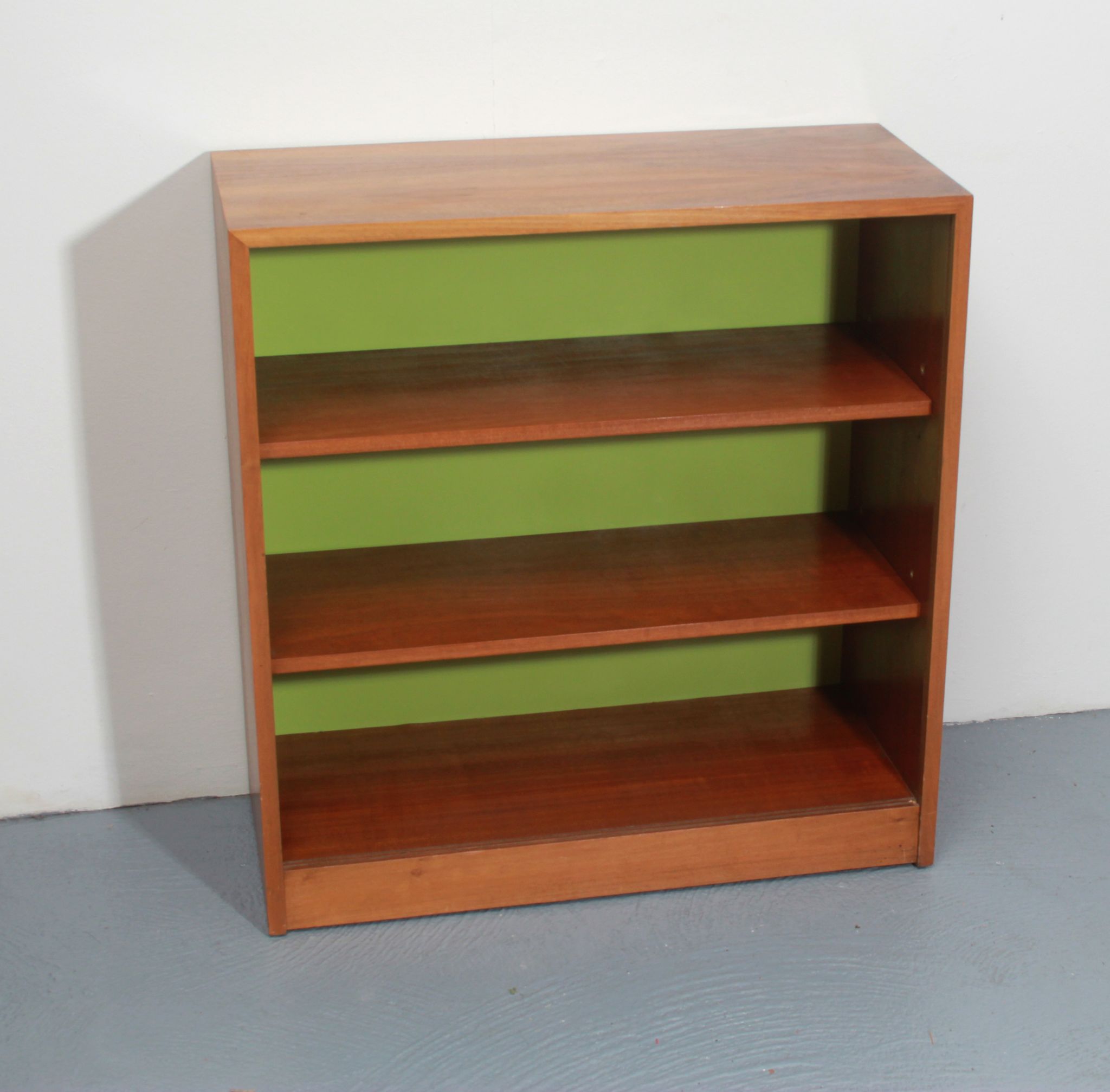 1960s bookcase with green back panel