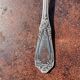 Strawberry spoon or antique Art Nouveau fruit salad in silver metal.