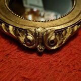 Petit miroir bois doré sculpté