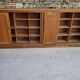 Oak workshop furniture with sliding doors.