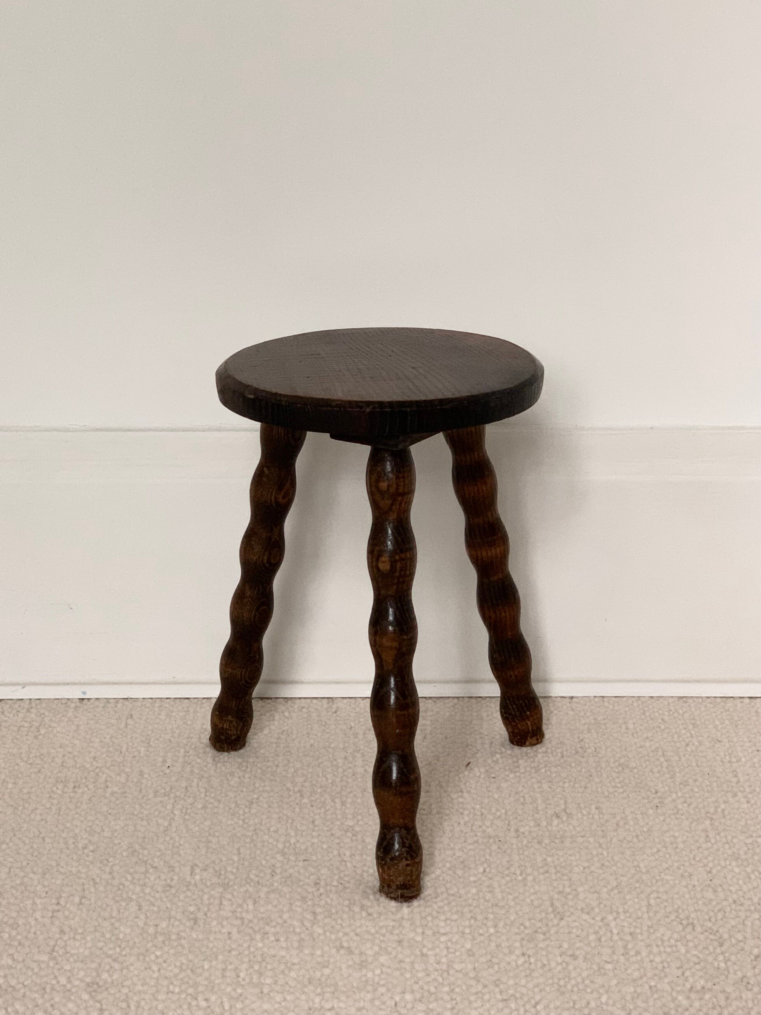 Wooden tripod stool