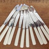 Lot de 24 couteaux de tables et entremet A. Peter