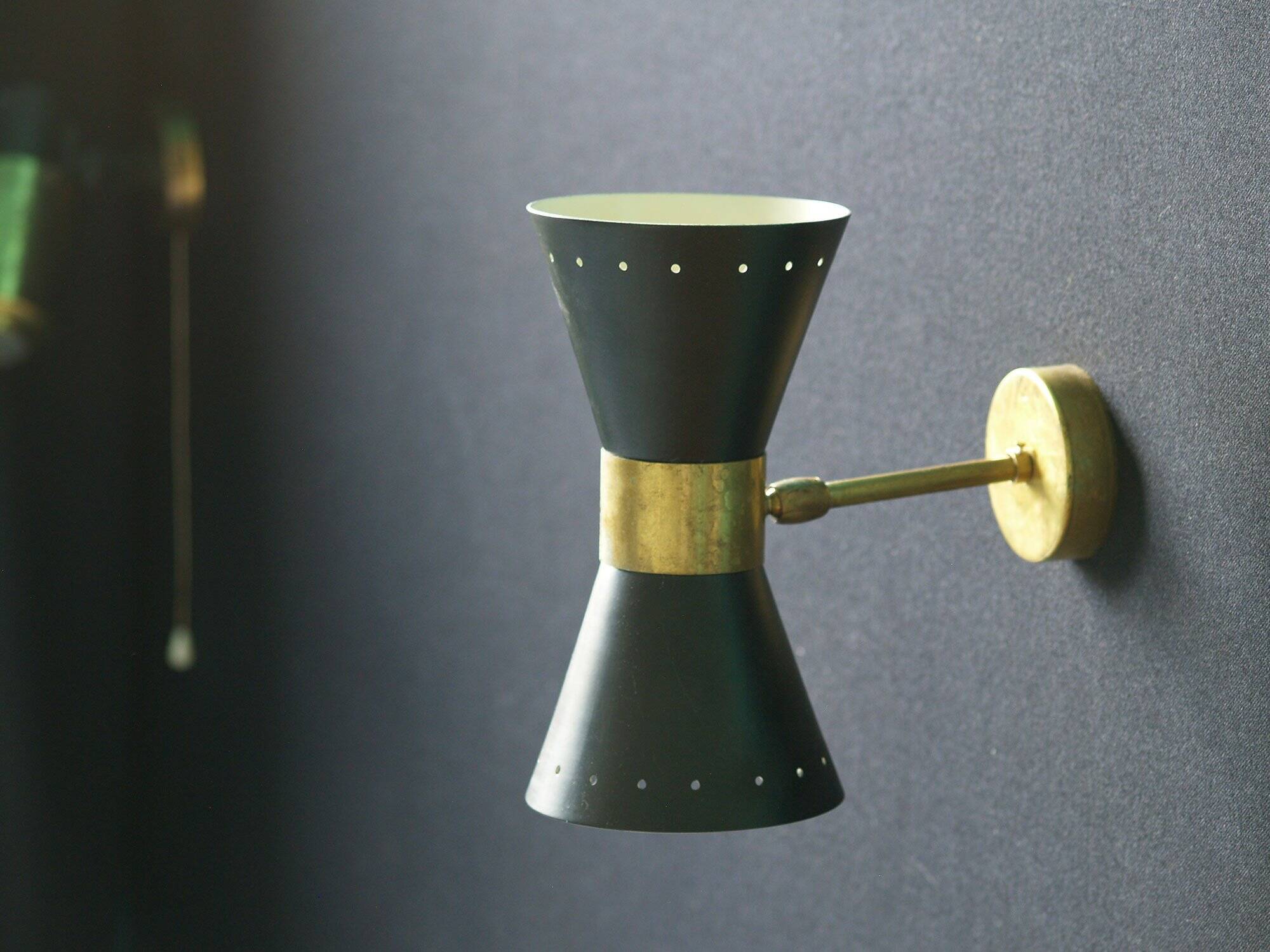 Pair of Italian diabolo design wall lights from the 1950s