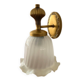 Gold wall sconce with ecru globe