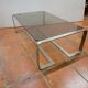 Coffee table with stainless steel base and smoked glass, from the 70s