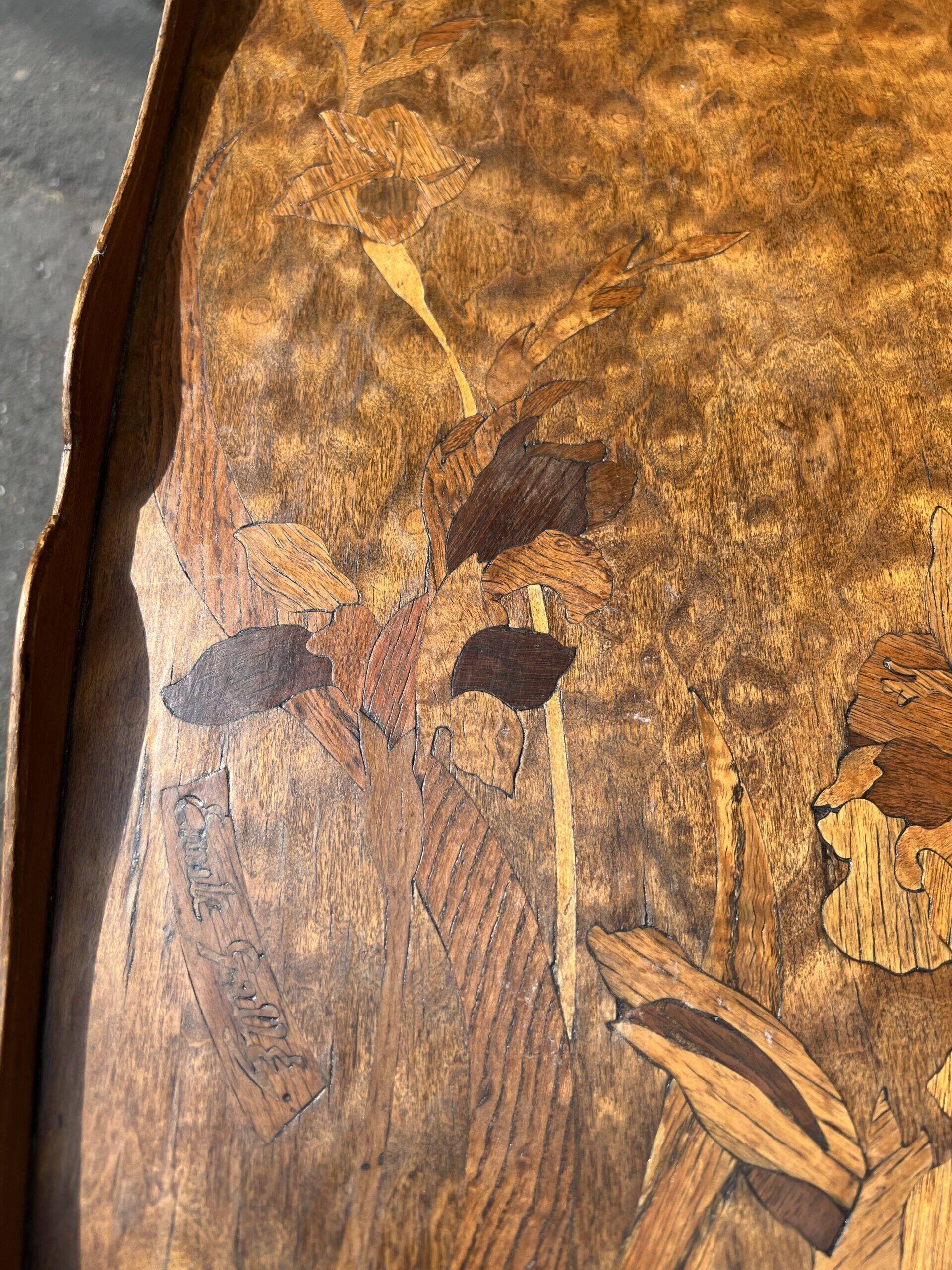Art Nouveau period two-tiered tea table in veneered wood, signed Émile Gallé