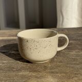 Set of 4 vintage speckled beige stoneware coffee cups.