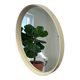 Beige vintage round mirror in a space style / wall mirror