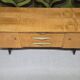 Vintage low enfilade from the 50s/60s – sculptural handles & tapered legs