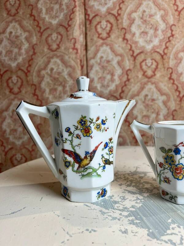 Limoges porcelain teapot/coffee pot and milk jug decorated with peacocks