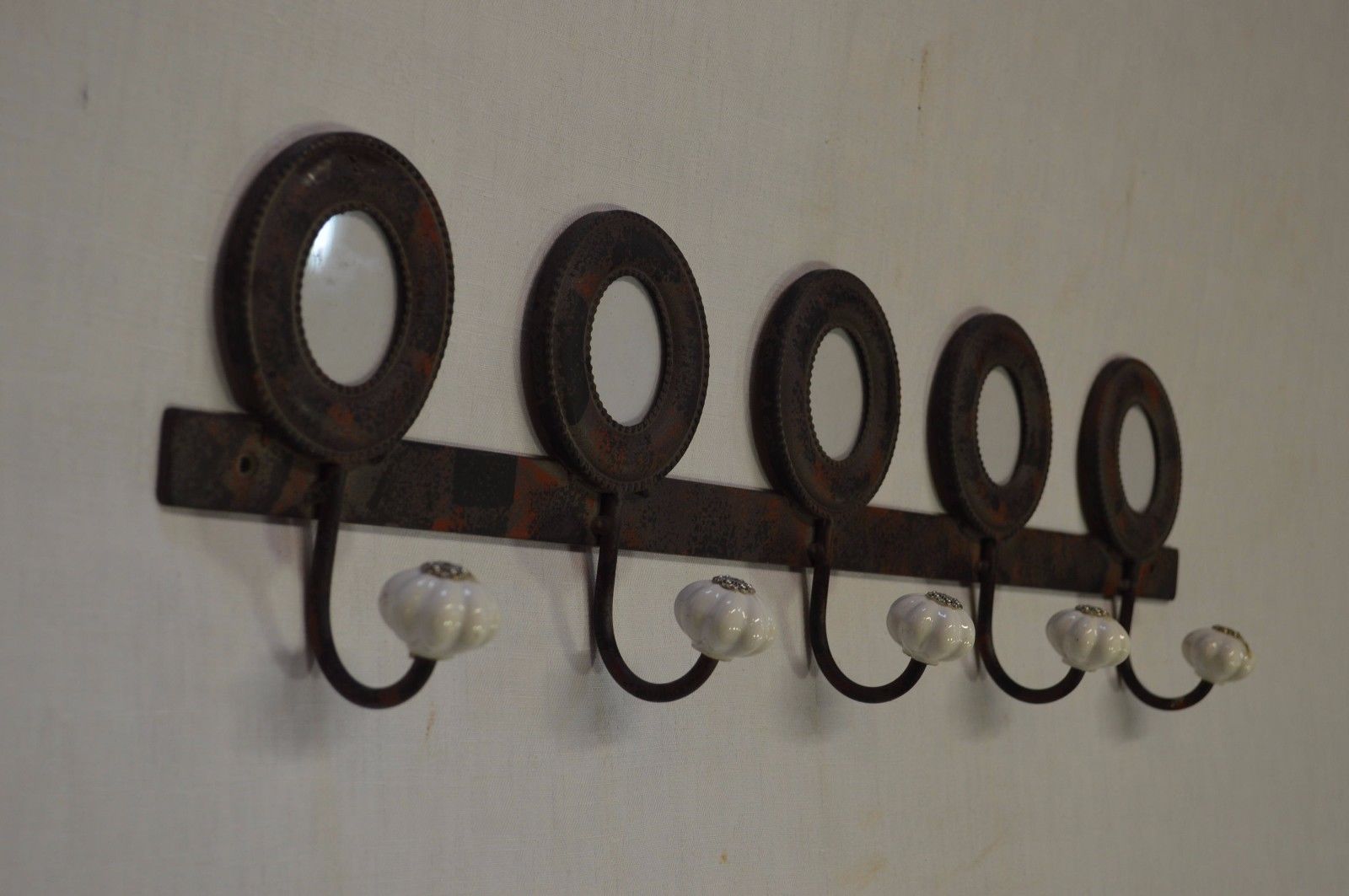 Iron coat holder with picture frames