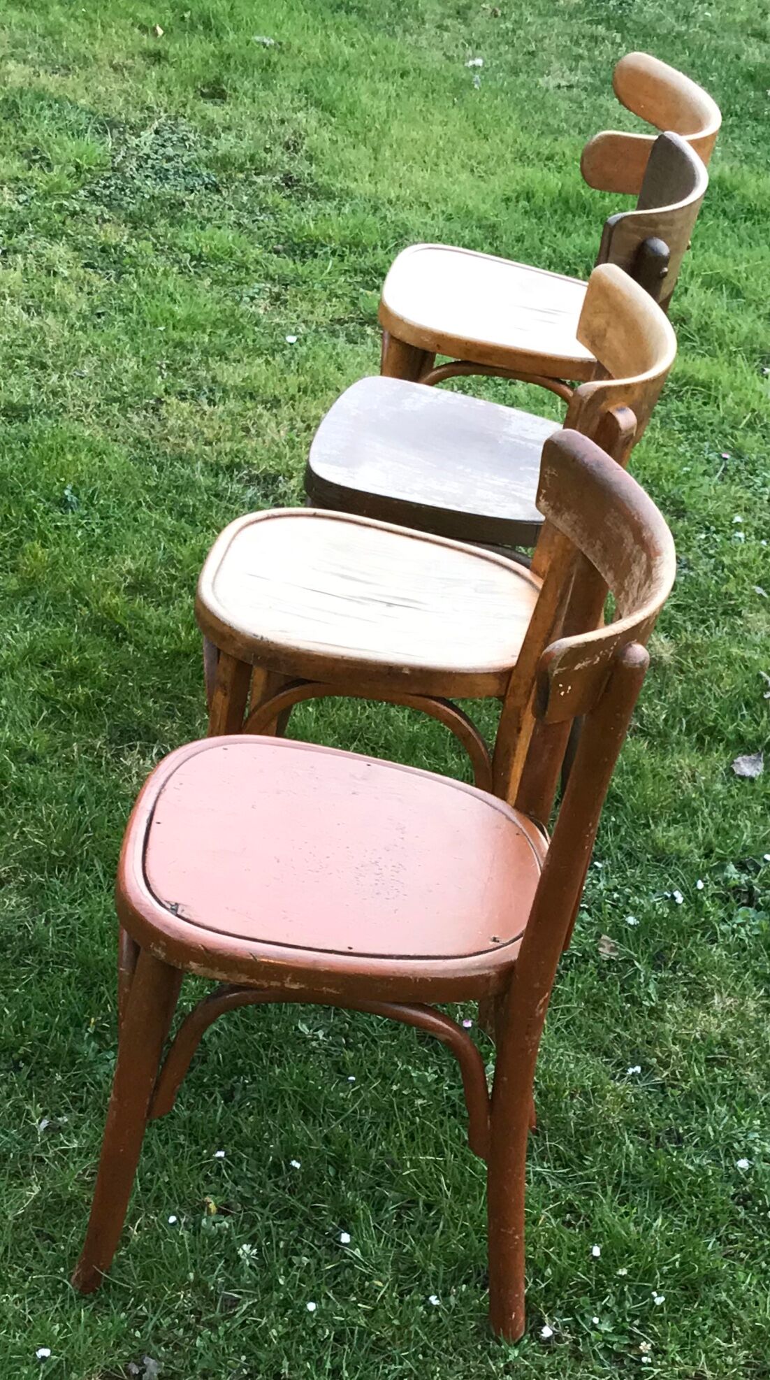 Series of 4 mismatched bistro chairs