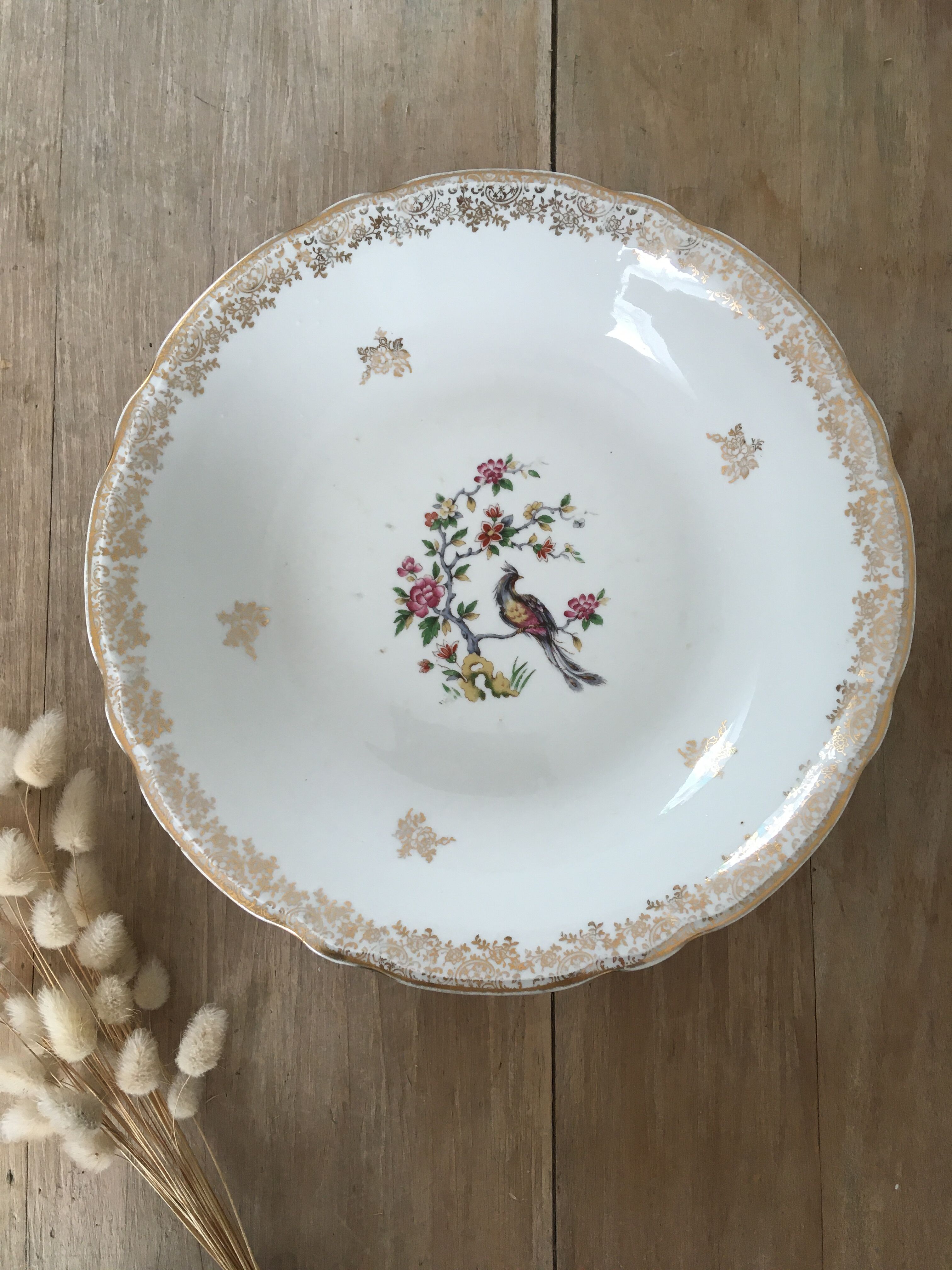 Hollow dish porcelain bird of paradise