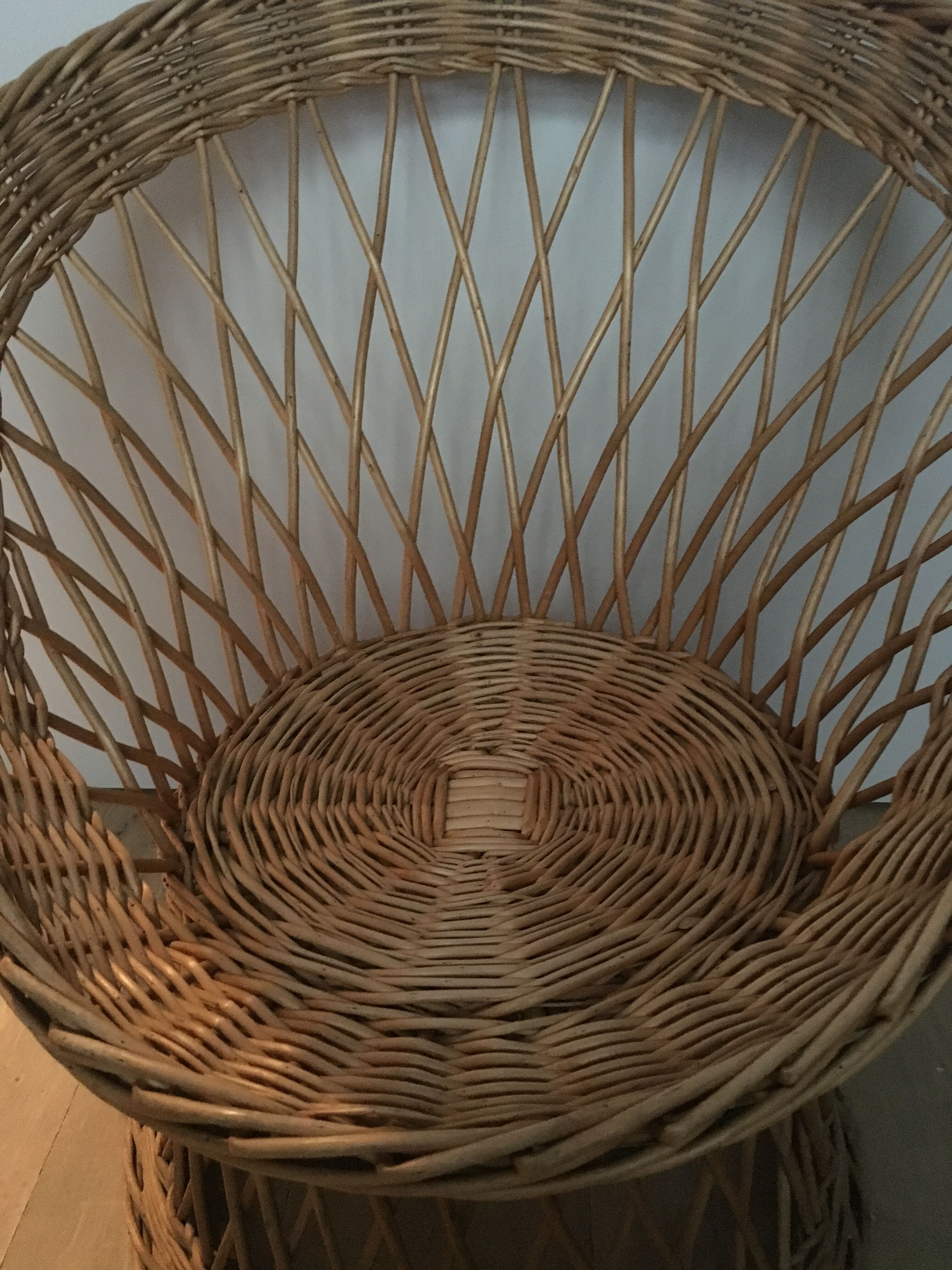 Armchair in rattan basket