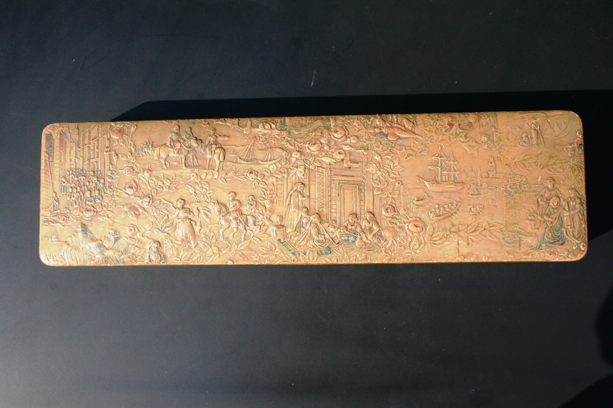 Old embossed leather glove box decorated scenes