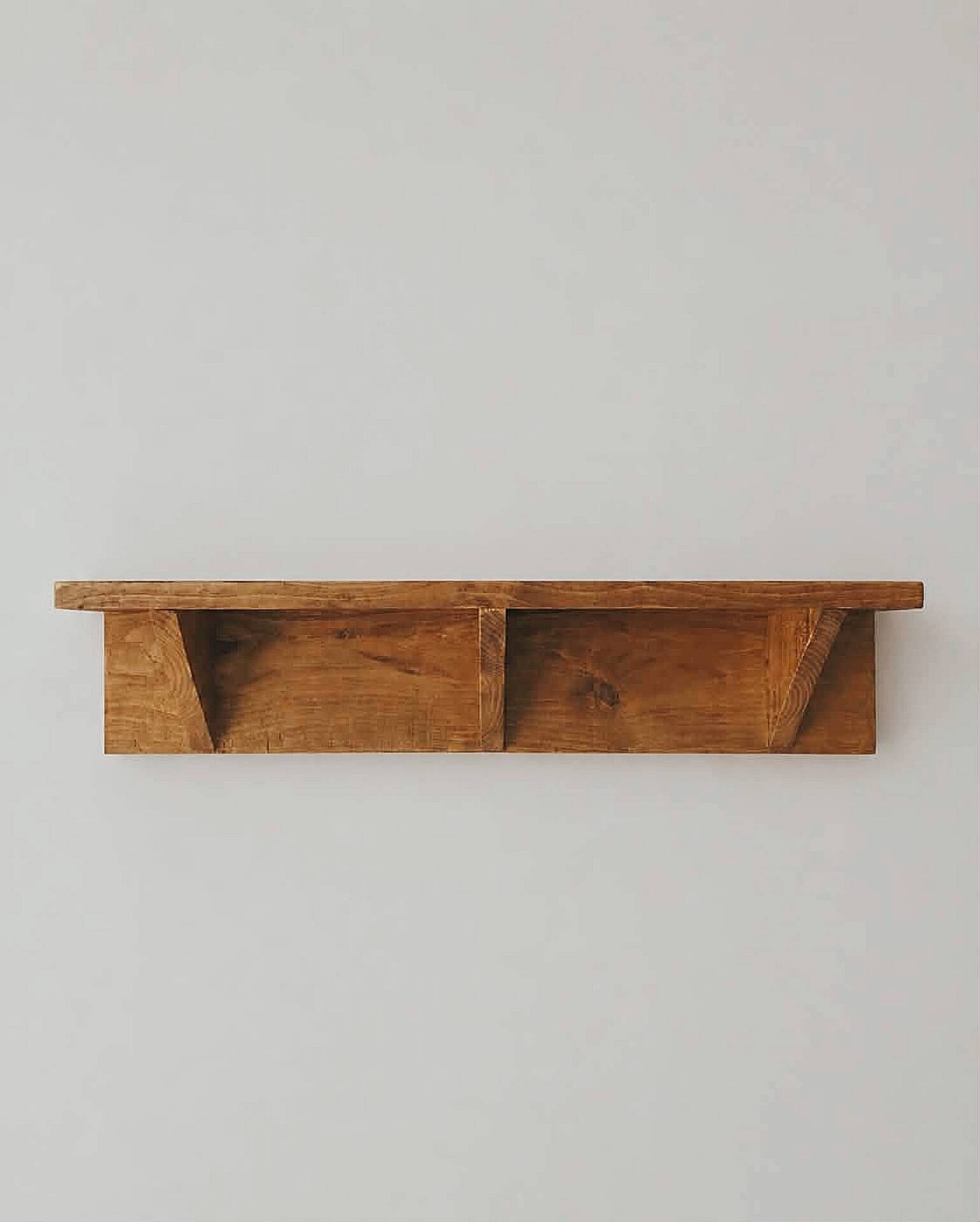 Handcrafted wall shelf in solid fir.