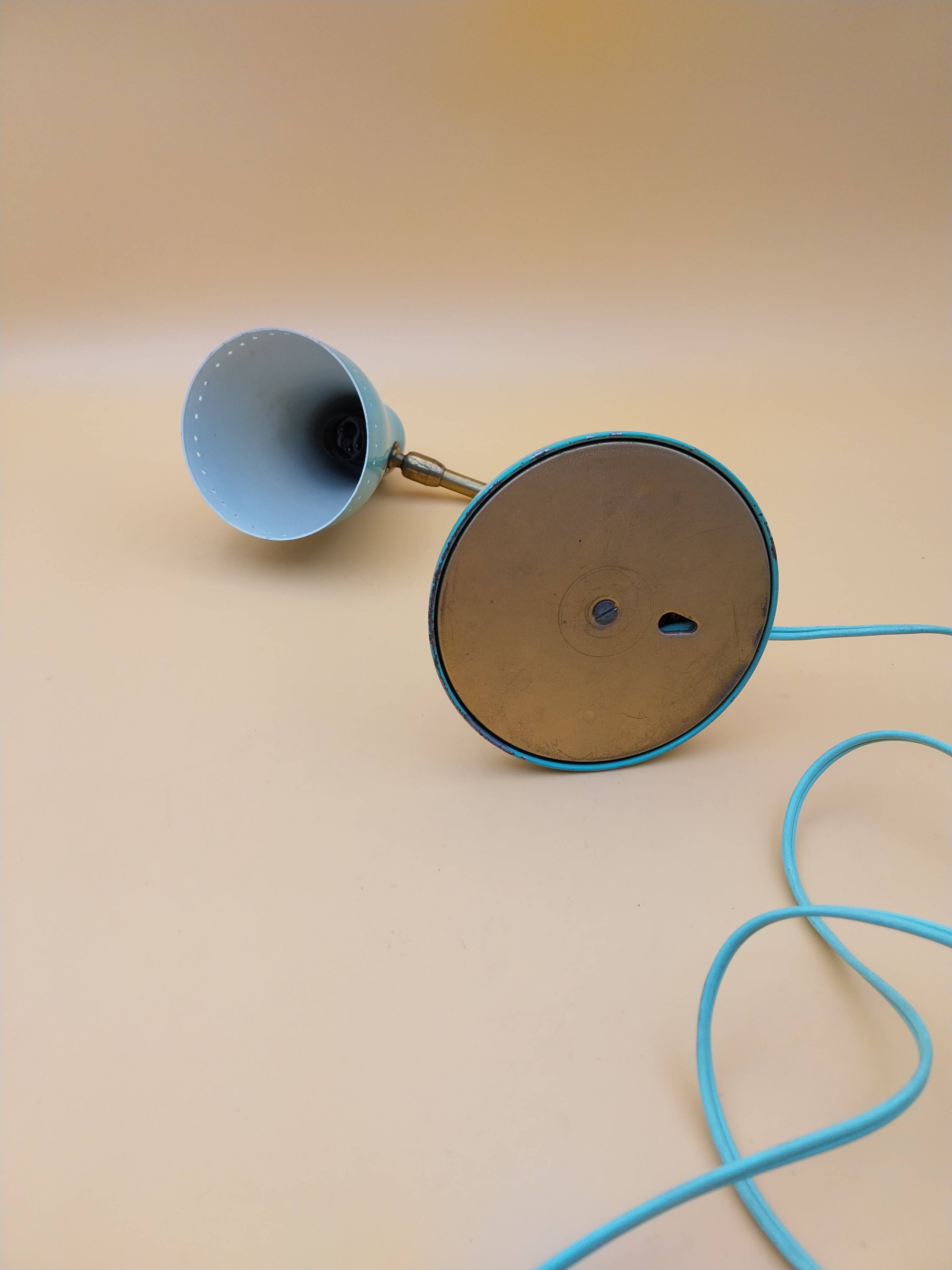 Green brass desk lamp with a goose neck on a ball joint from the 1960s.