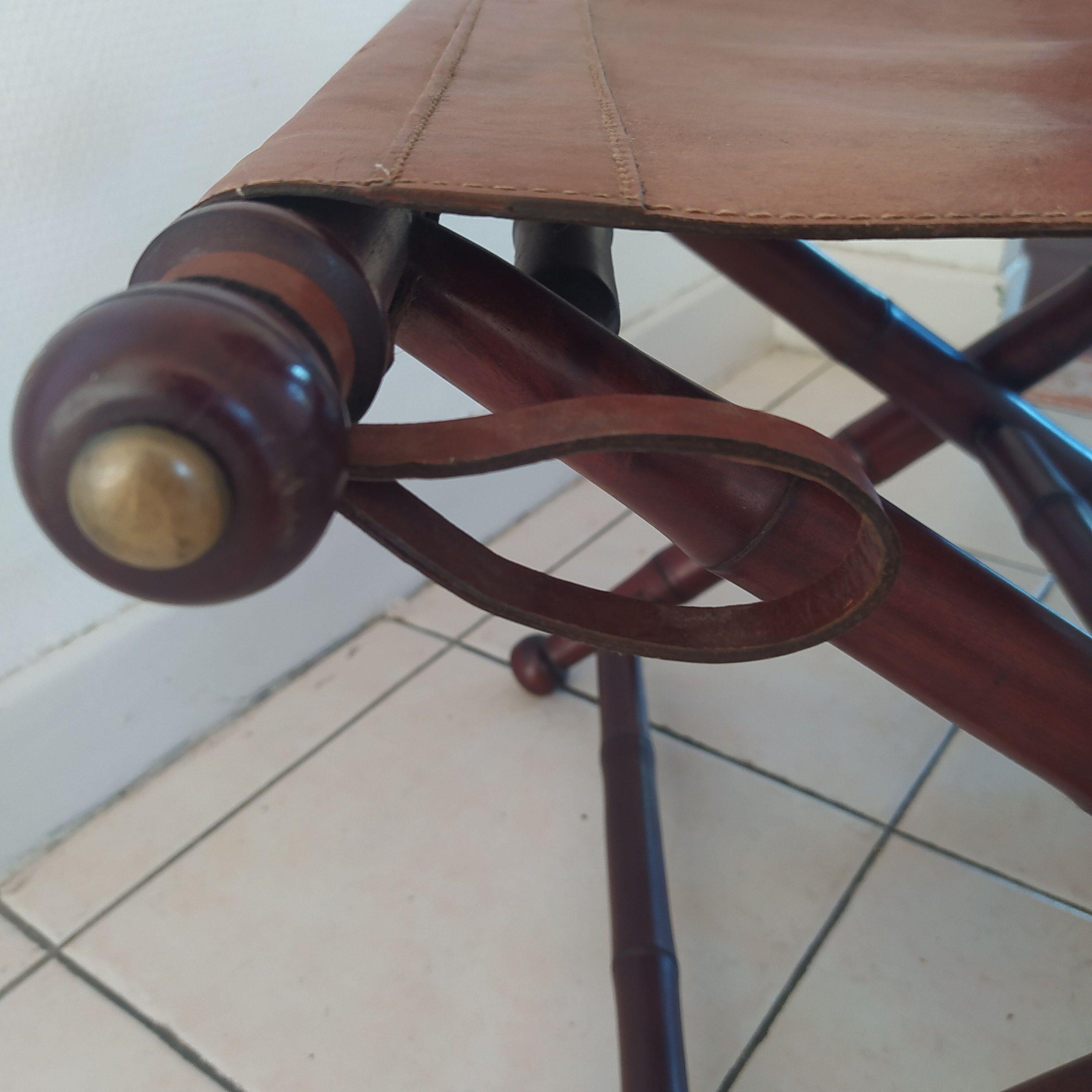 Vintage foldable leather and mahogany stool