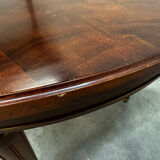 Extendable mahogany round table in Louis XVI style