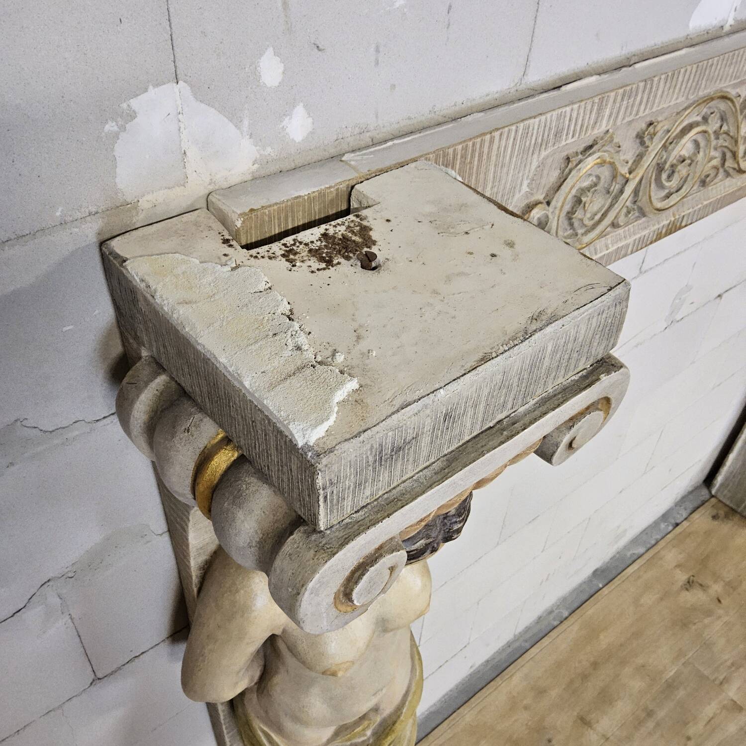 Neoclassical plaster fireplace with caryatids (nude women)