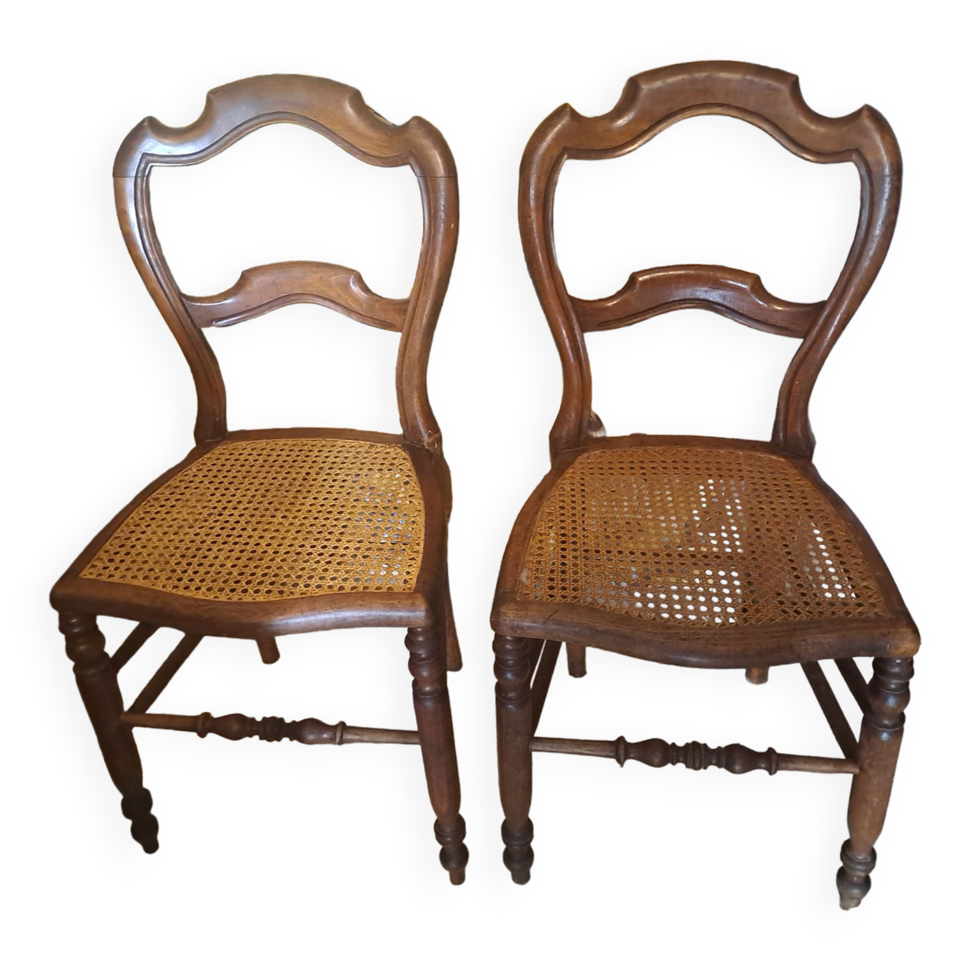 Pair of 1950s light wood bistro chairs with cane seats