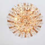 Delicate chandelier in gilded brass and crystal glass in the shape of flowers by Palwa, Germany, 1970s.