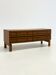 Italian low wooden sideboard with graphic black lines
