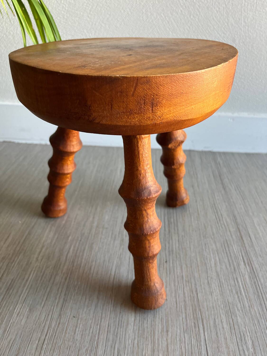 Wooden tripod stool