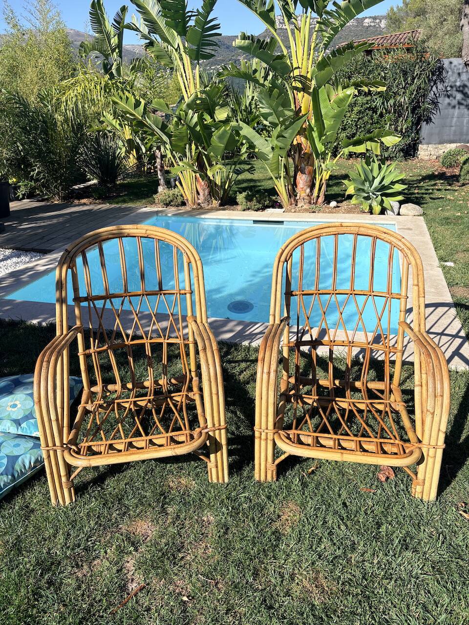 Pair of rattan armchairs "Audoux-Minnet" 1960