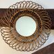 Round rattan mirror from the 1950s France