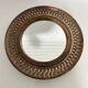 Chiselled stone mirror