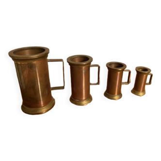 4 copper and brass pitchers