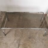 Table basse chrome et verre fumé