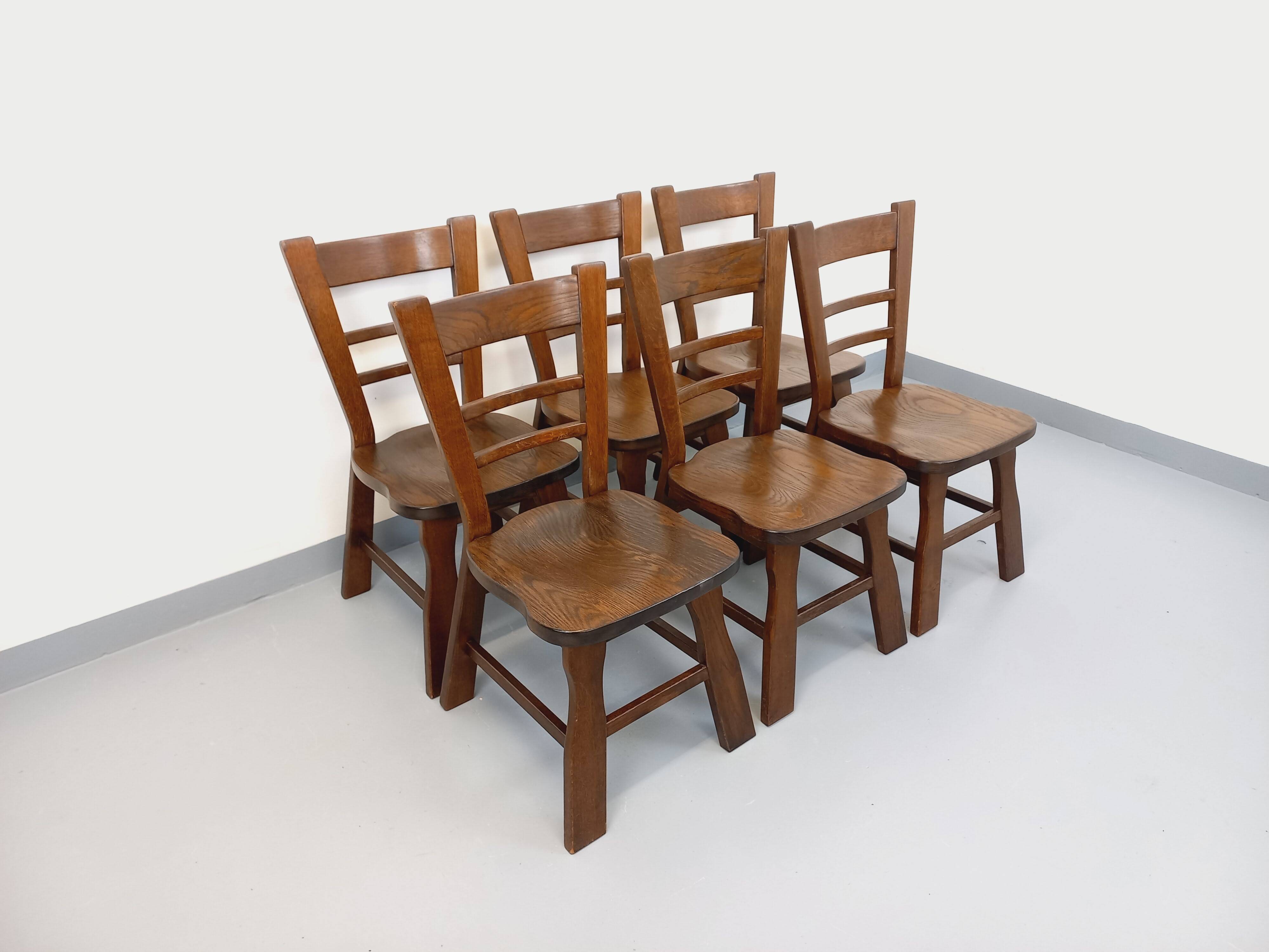 Set of 6 vintage brutalist oak chairs from the 1950s.