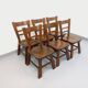 Set of 6 vintage brutalist oak chairs from the 1950s.