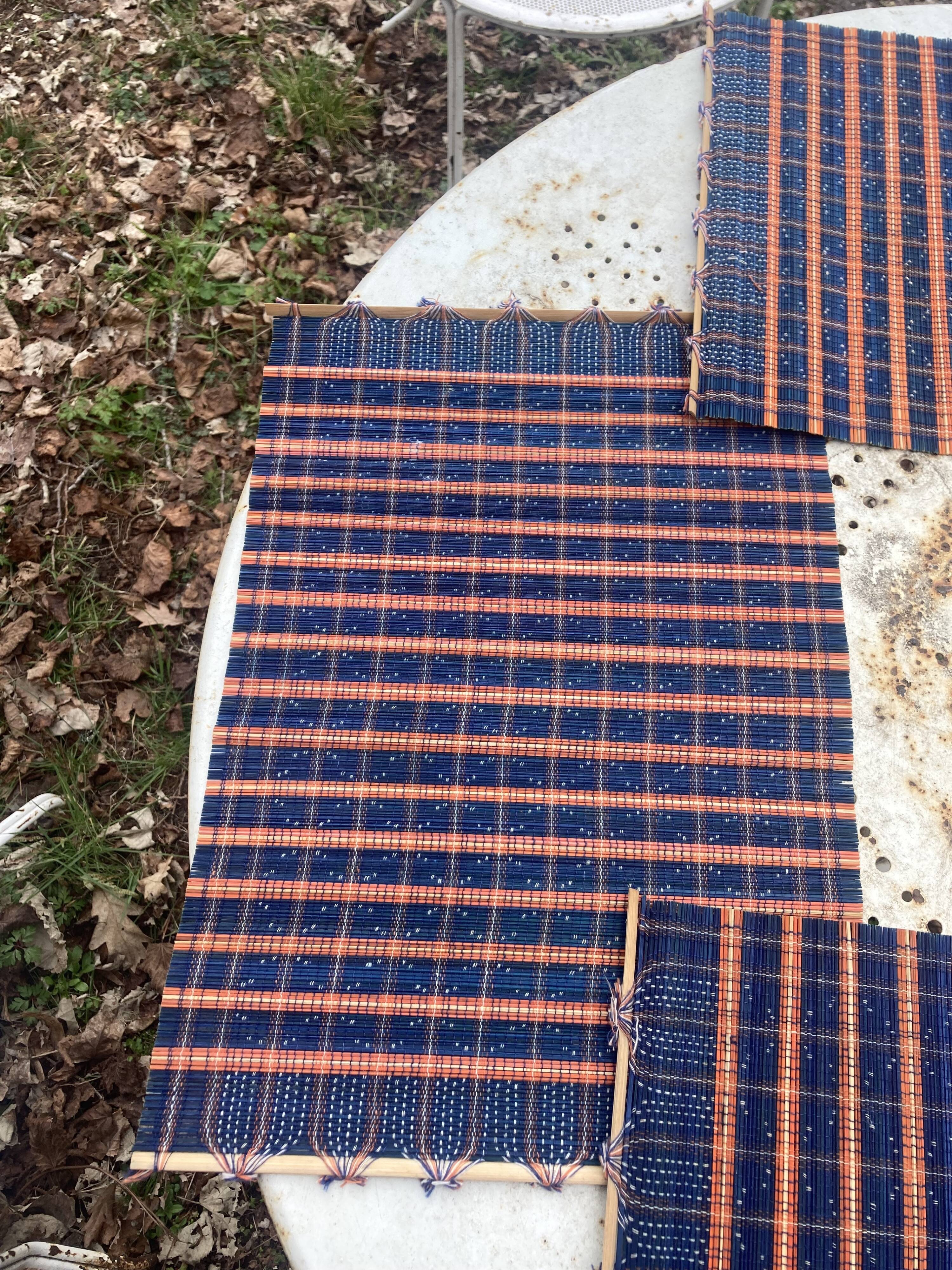 4 blue wicker placemats